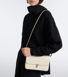 Toteme T-Lock patent leather crossbody bag