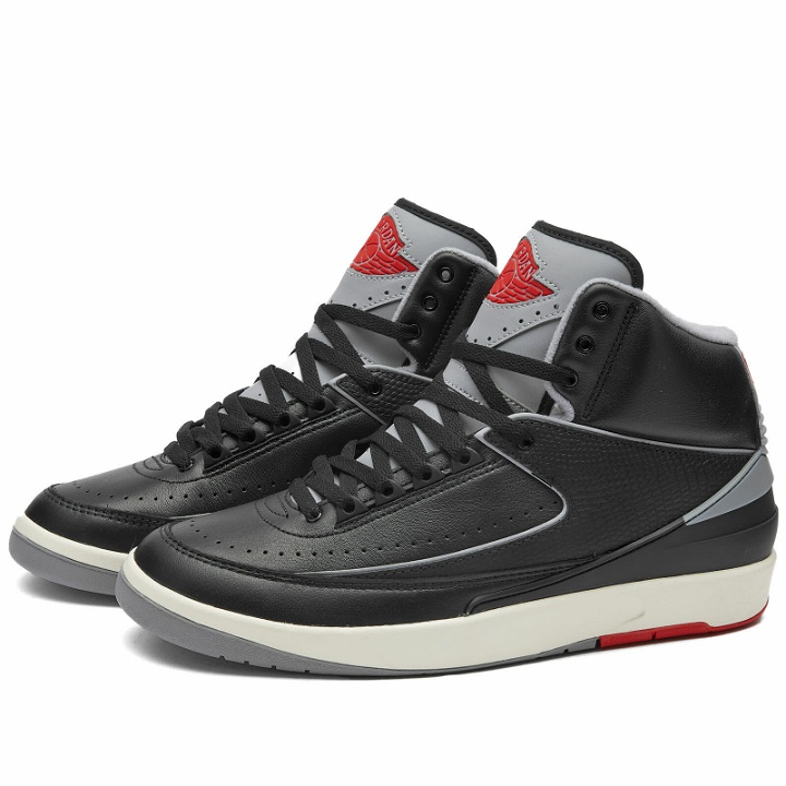 Photo: Air Jordan Men's 2 Retro Sneakers in Black/Cement Grey/Red/Sail