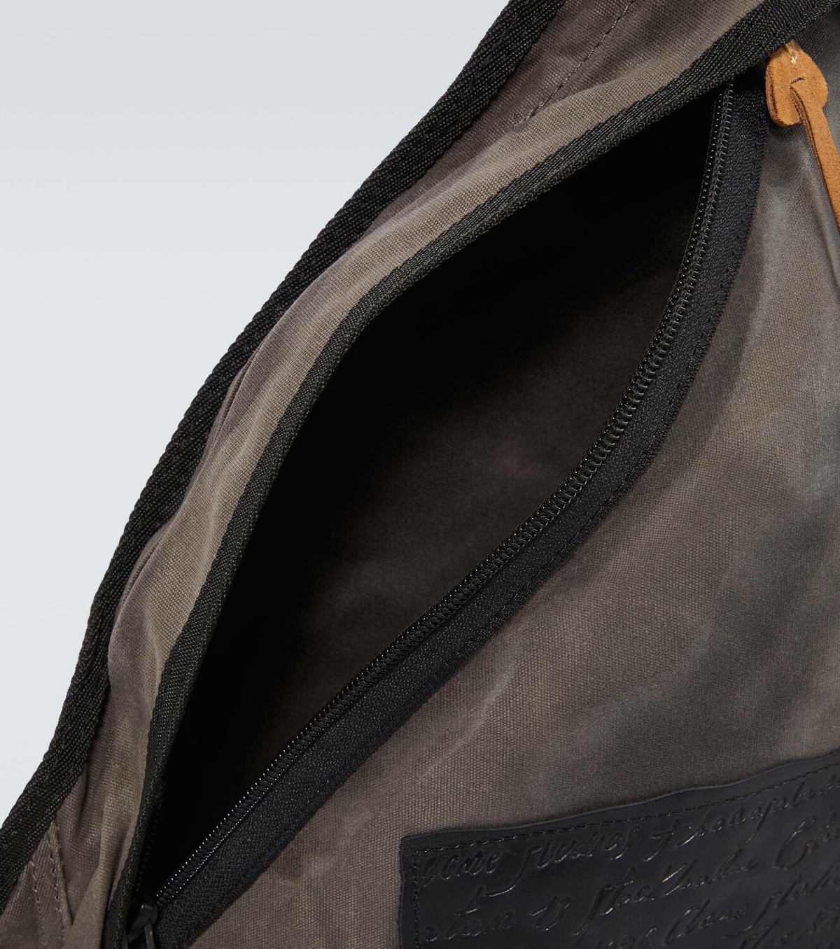 Acne Studios Sling leather-trimmed canvas backpack