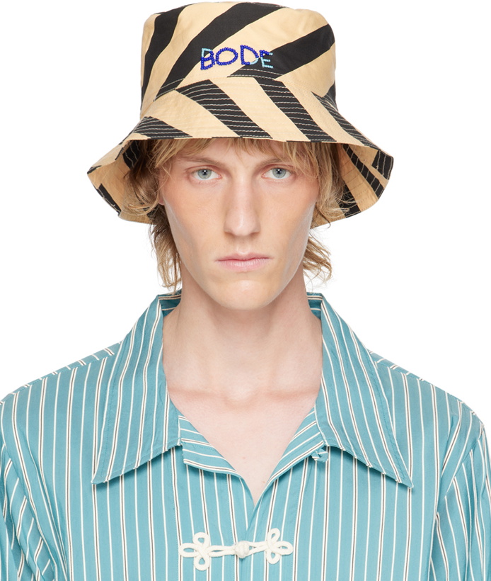 Photo: Bode Beige & Black Domino Stripe Bucket Hat