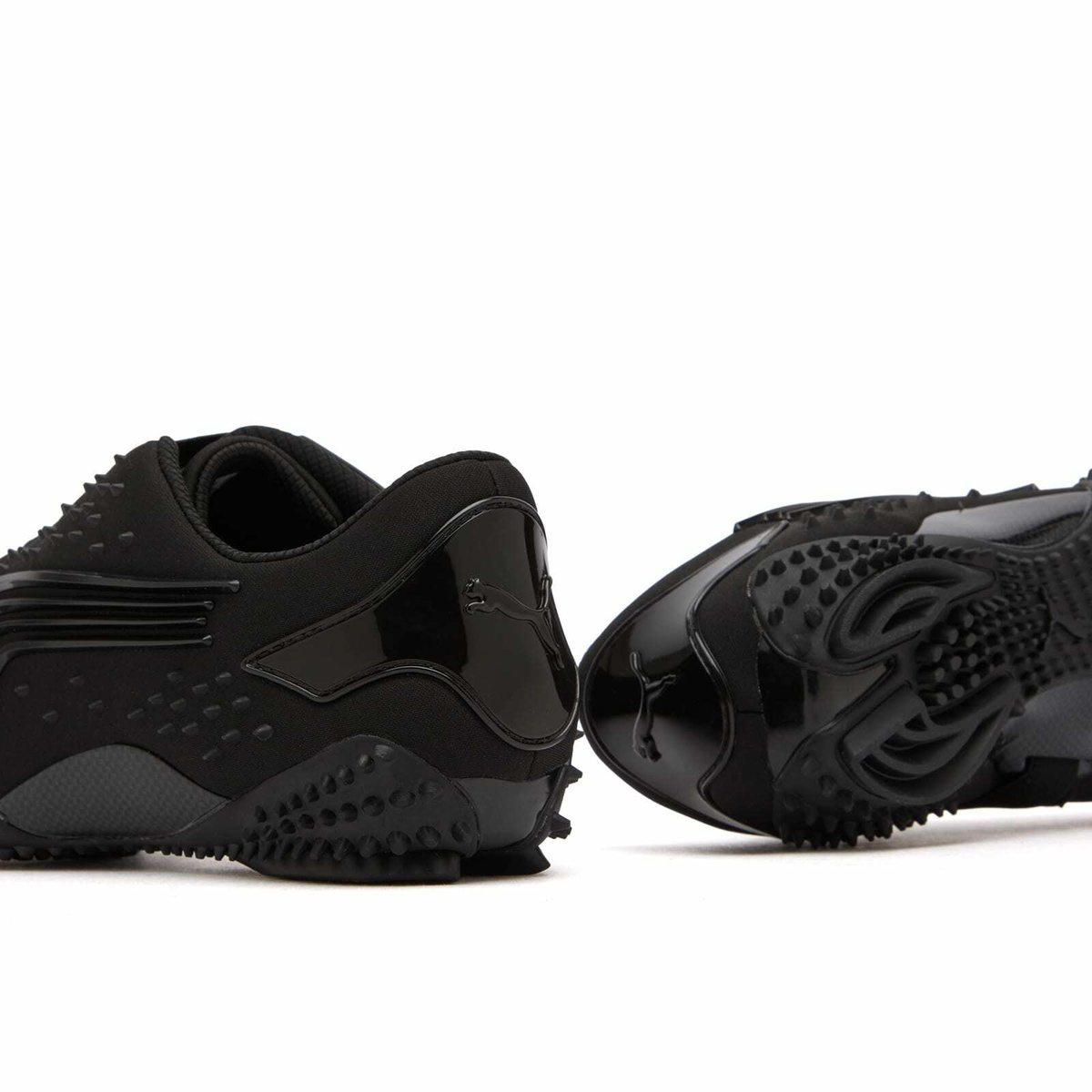 Puma Mostro Spikes Sneaker in Black/Silver