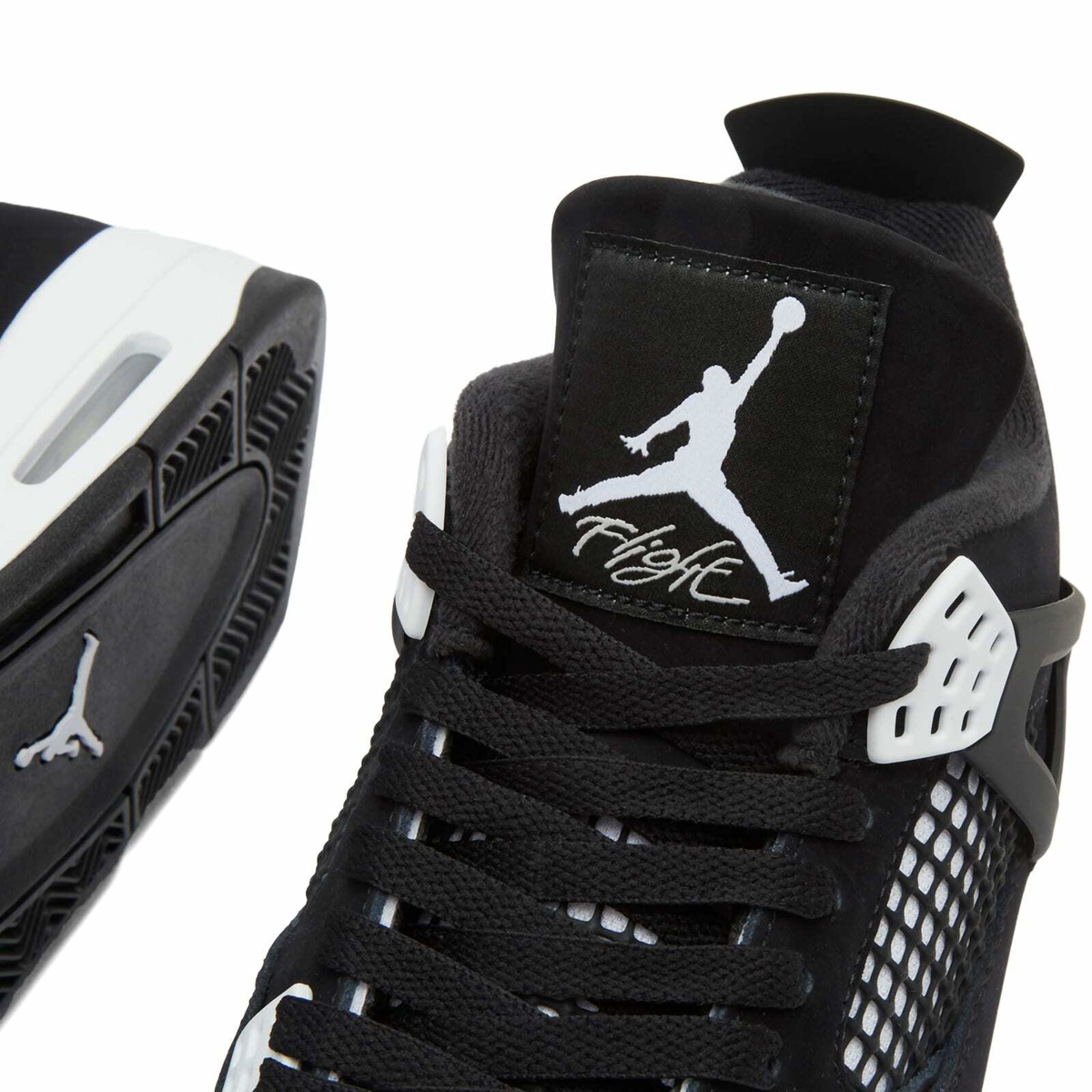 Air Jordan 4 Retro RMSTD Sneaker in Black/White Nike Jordan