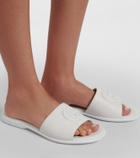 Gucci Double G leather slides