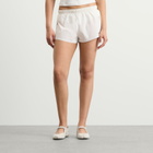 Nike Women's x SKIMS Stretch Nylon Runner Short in Ivory