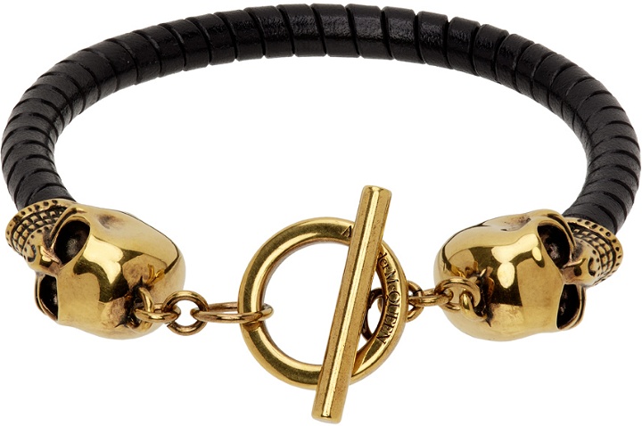 Photo: Alexander McQueen Black & Gold T Bar Skull Bracelet
