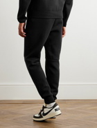 Nike - Tapered Cotton-Blend Tech Fleece Sweatpants - Black