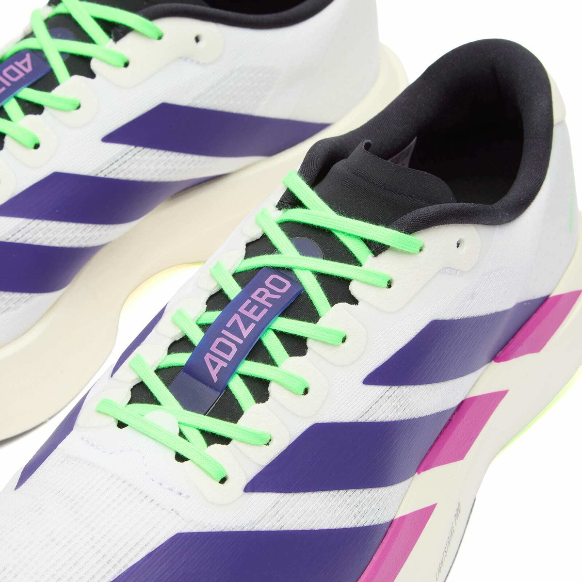 Adidas Running adidas Adizero Evo SL Sneaker in White/Collegiate Purple/Lime Burst