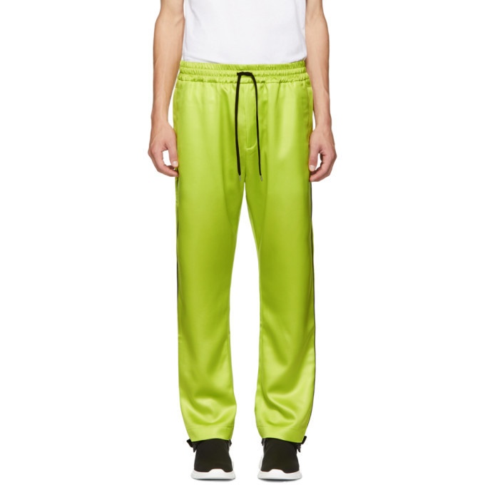 Photo: CMMN SWDN Yellow Buck Piping Track Pants