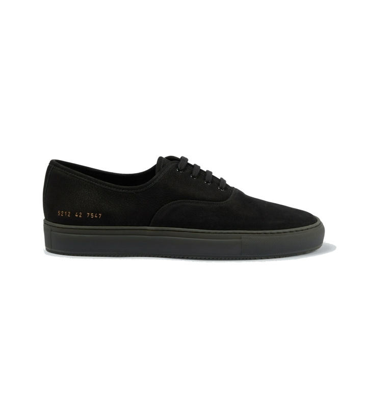 Photo: Common Projects - Four Hole suede sneakers