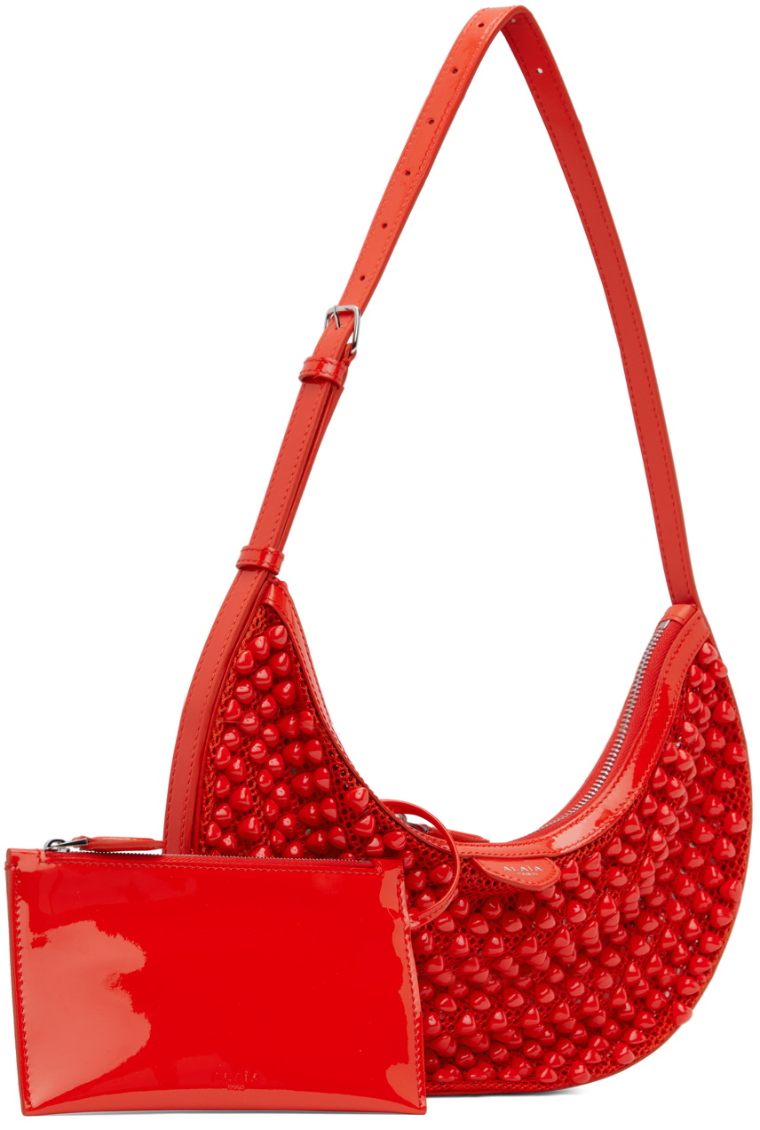 【ALAIA】 オレンジ One Piece Demi Lune バッグ One Piece Demi Lune mesh shoulder bag in orange - Alaia