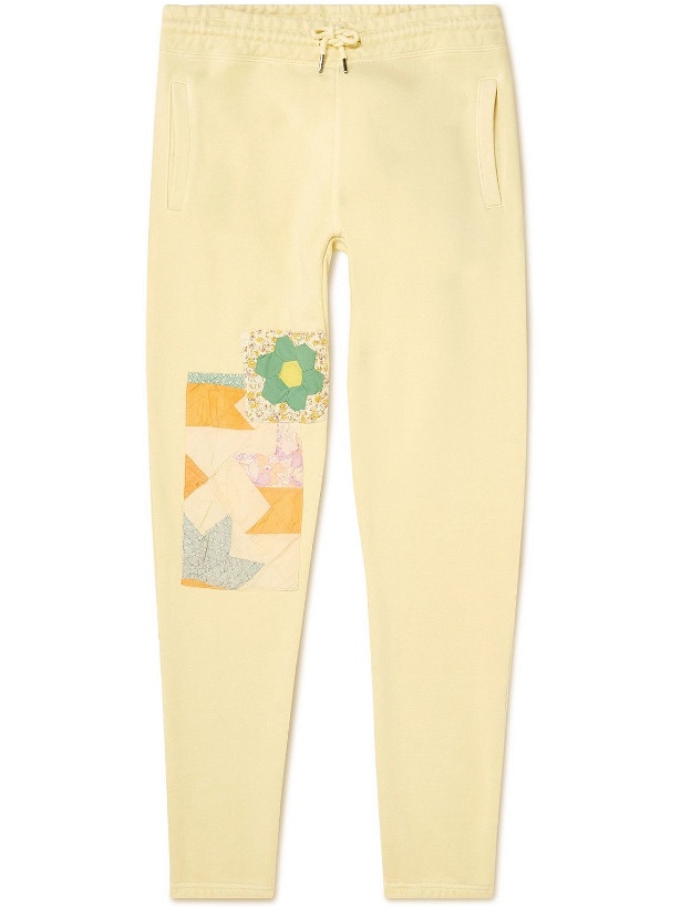 Photo: Carleen - Tapered Upcycled Patchwork Organic Cotton-Jersey Sweatpants - Yellow