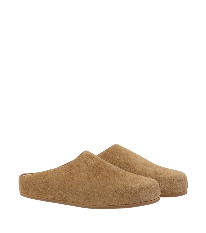 Photo: Studio Nicholson Wearing suede mules