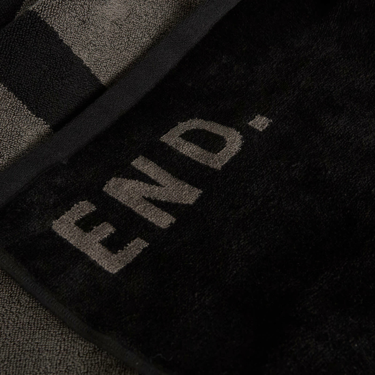 END. x and wander Towel in Charcoal 