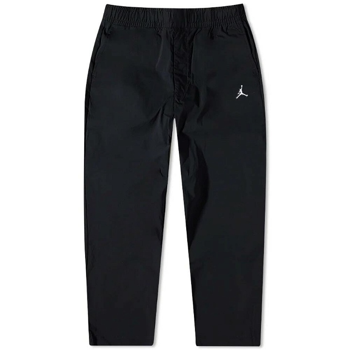 Photo: Air Jordan Men's Essential Woven Pant in Black/White