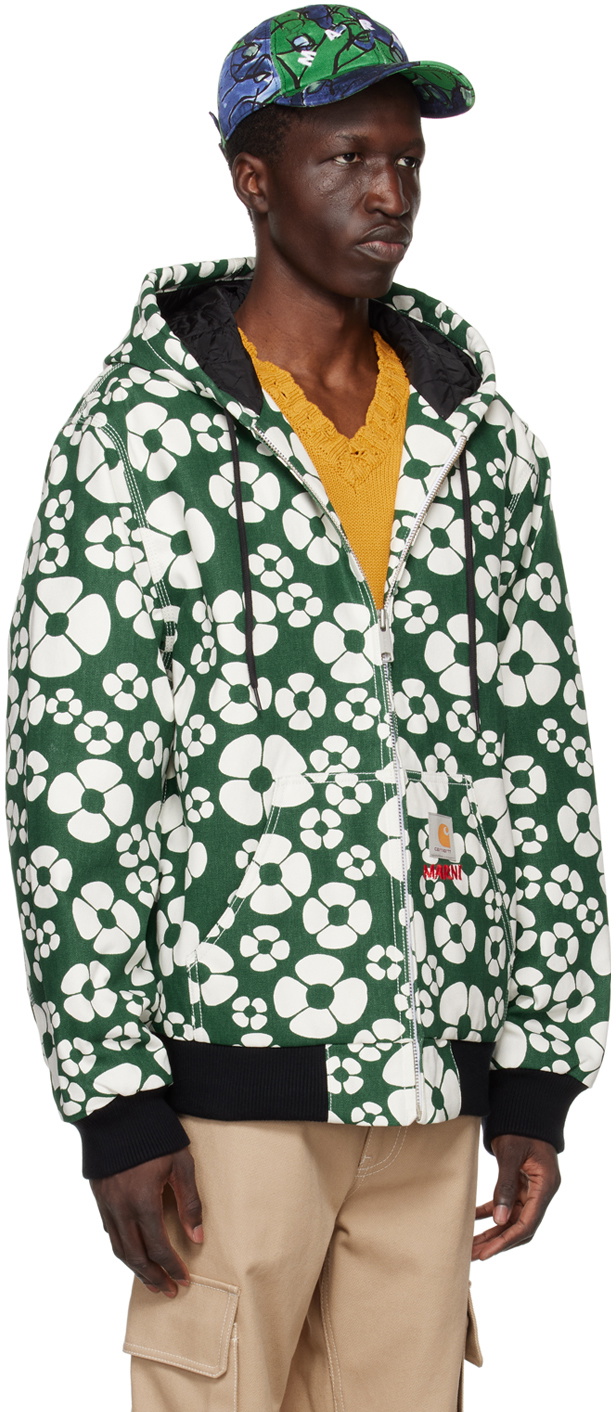 https://cdn.clothbase.com/uploads/4f060fc9-f0fa-4092-8c1c-472a0bef216a/green-and-white-carhartt-wip-edition-floral-jacket.jpg