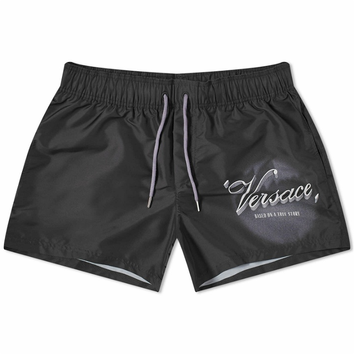 Photo: Versace Men's Film Title Swim Shorts in Black/Print