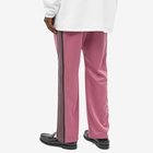 Needles Men's Poly Smooth Narrow Track Pant in Smoke Pink