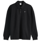 Nike Women's Essential Oversized Long-Sleeve Polo in Black/Sail