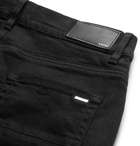 AMIRI - Skinny-Fit Embellished Twill-Panelled Distressed Stretch-Denim Jeans - Black