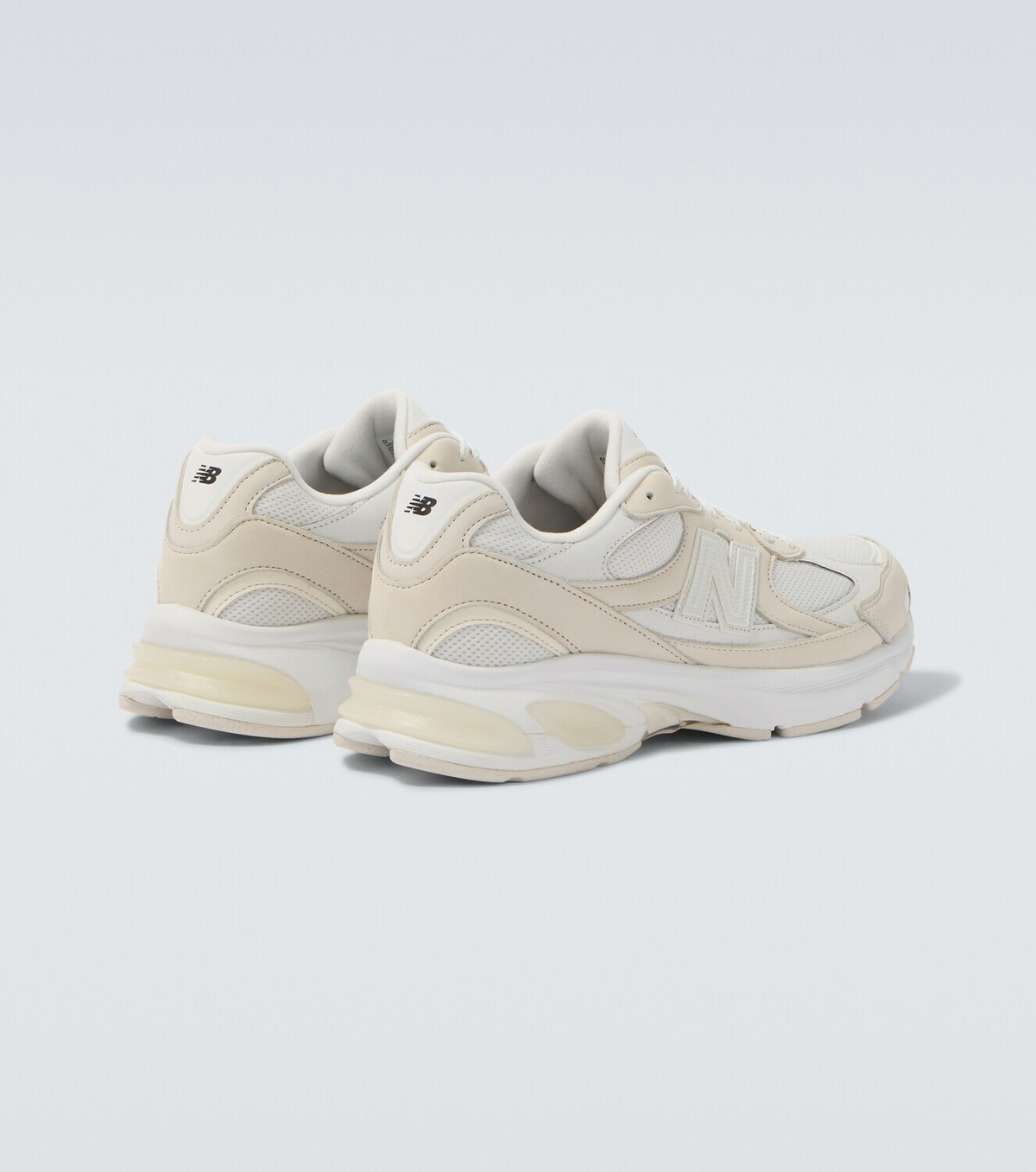 Comme des Garçons Homme x New Balance 2010 leather-trimmed sneakers