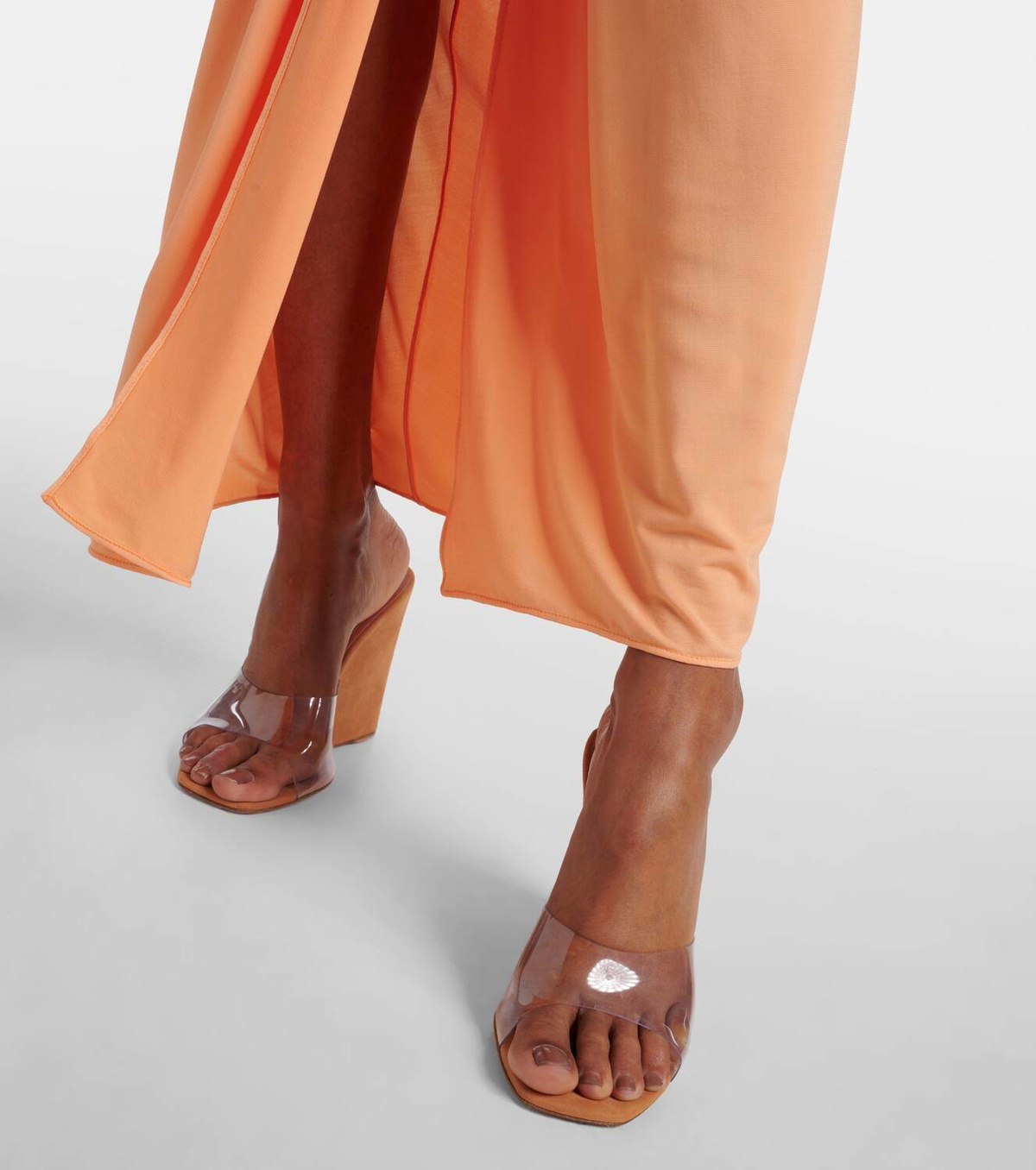 Amina Muaddi Lupita Half Glass PVC and suede wedge mules