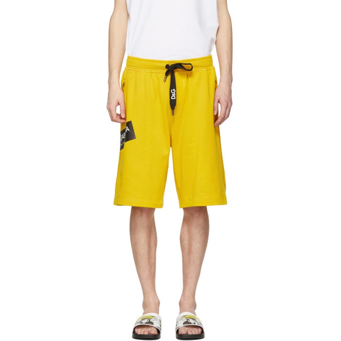 Photo: Dolce and Gabbana Yellow Logo Sweat Shorts