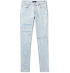 AMIRI - Distressed Paint-Splattered Stretch-Denim Jeans - Blue