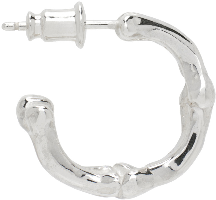 Photo: TAKAHIROMIYASHITA TheSoloist. Silver Bone Shaped M Single Earring