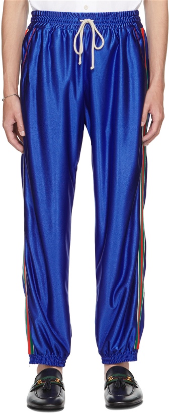 Photo: Gucci Blue Shiny Jersey Web Track Pants
