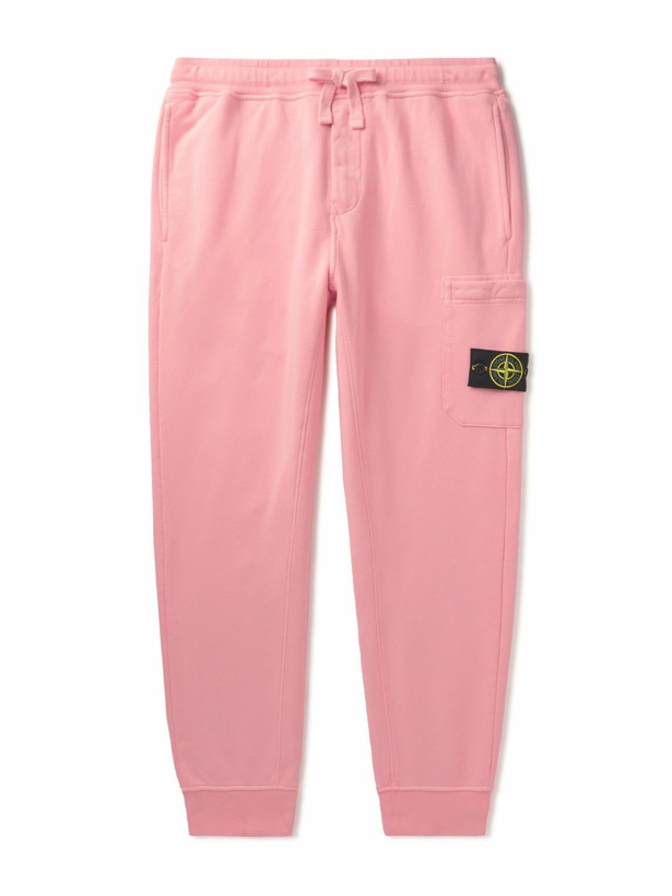 Photo: Stone Island - Tapered Logo-Appliquéd Garment-Dyed Cotton-Jersey Sweatpants - Pink