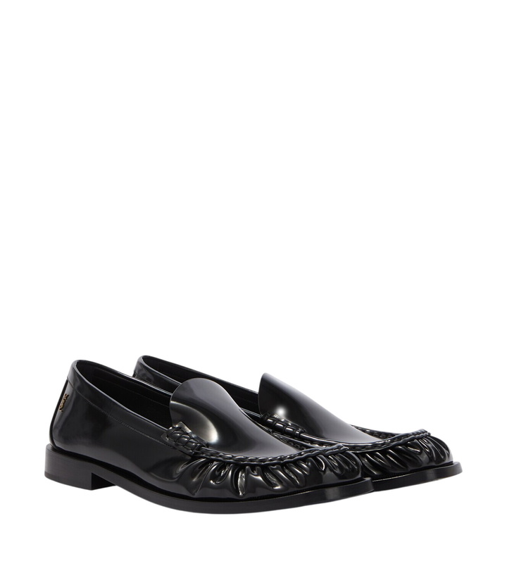 Photo: Saint Laurent Theobald Cassandre leather loafers