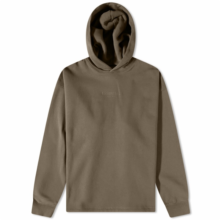 Photo: Fear of God ESSENTIALS Relaxed Logo Popover Hoodie in Wood