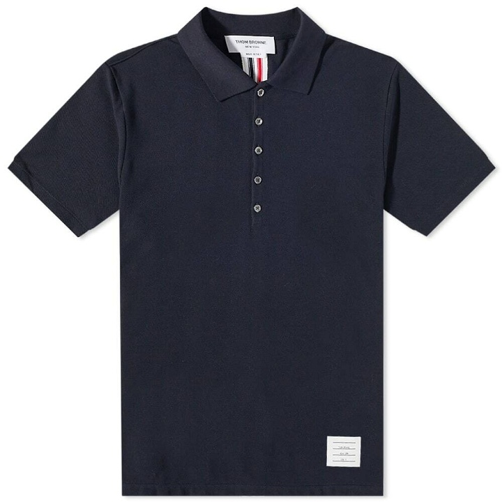 Photo: Thom Browne Men's Back Stripe Relaxed Fit Polo Shirt in Navy