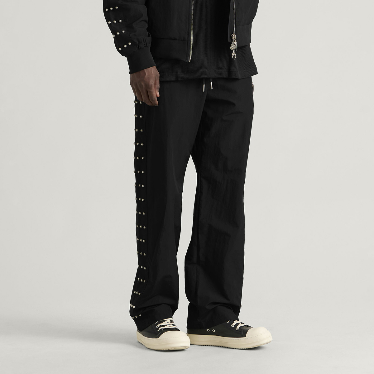 Thug Club Men's Triple Line Stud Track Pants in Black