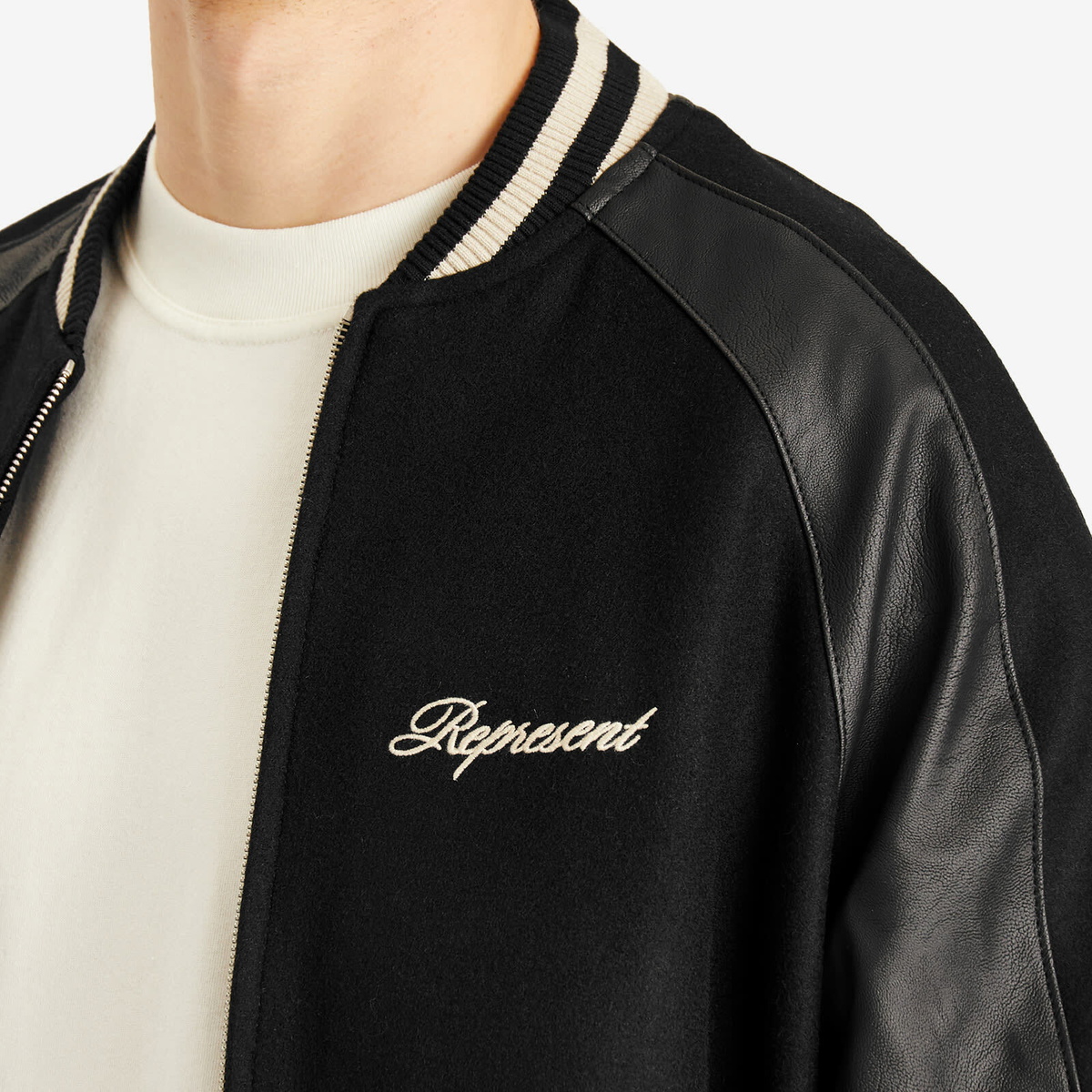 Represent Men's Raglan Varsity Jacket in Black Represent