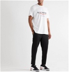 Givenchy - Tapered Logo-Appliquéd Fleece-Back Tech-Jersey Track Pants - Black