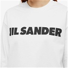 Jil Sander Front Logo Long Sleeve Top in Porcelain
