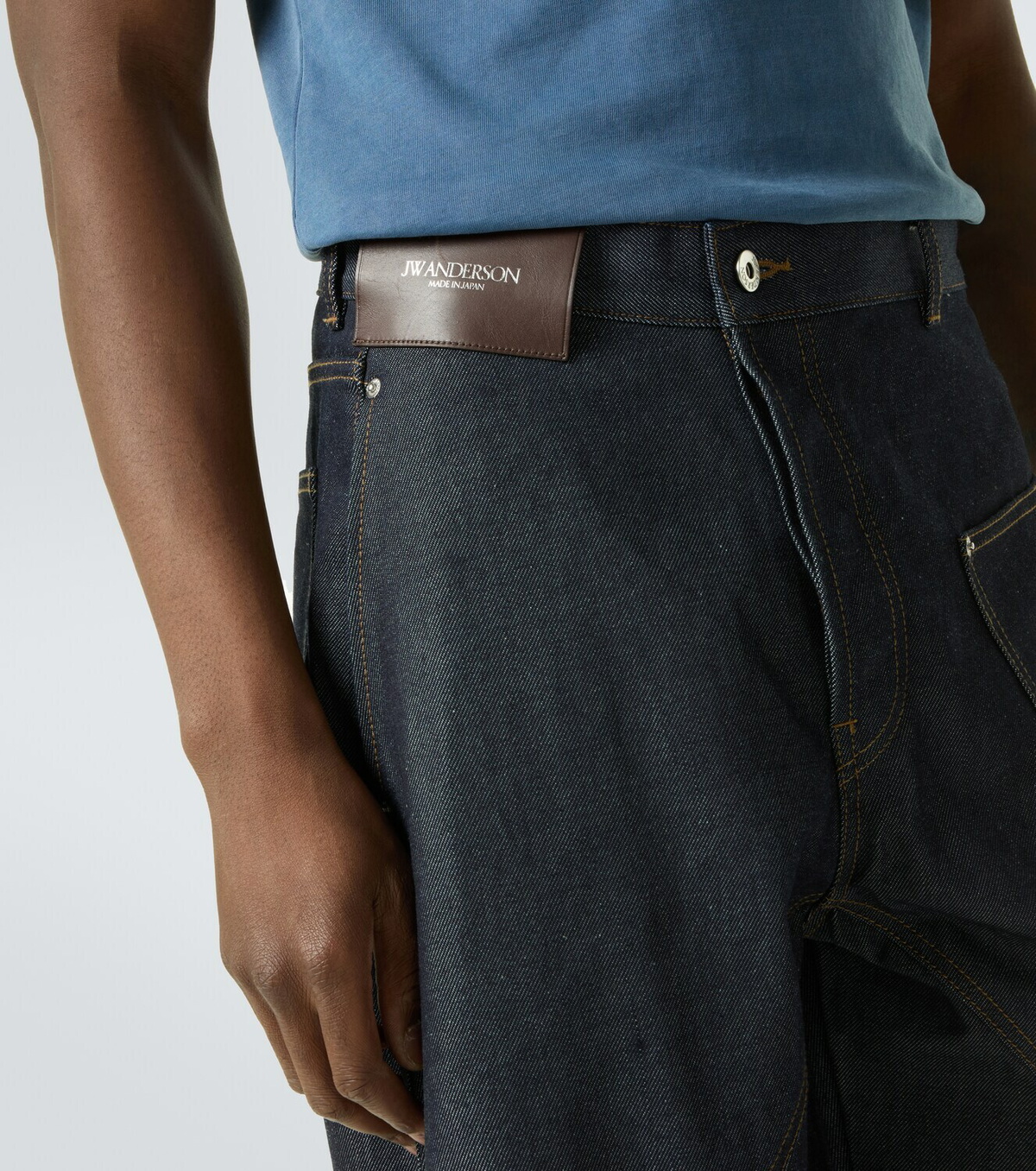 JW Anderson Twisted embroidered cotton wide-leg jeans