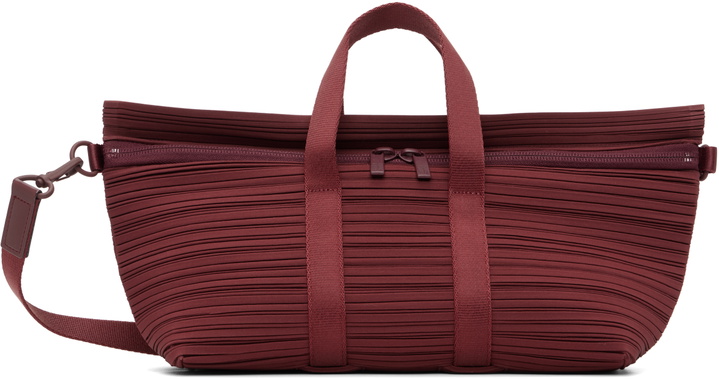 Photo: PLEATS PLEASE ISSEY MIYAKE Burgundy Pleats Boston Bag