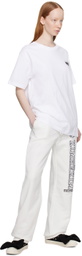 KIMHĒKIM White Pocket Stamped T-Shirt