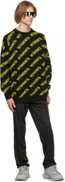 VETEMENTS Black & Yellow Allover Logo Sweater