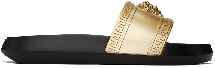 Photo: Versace Gold Palazzo Slides