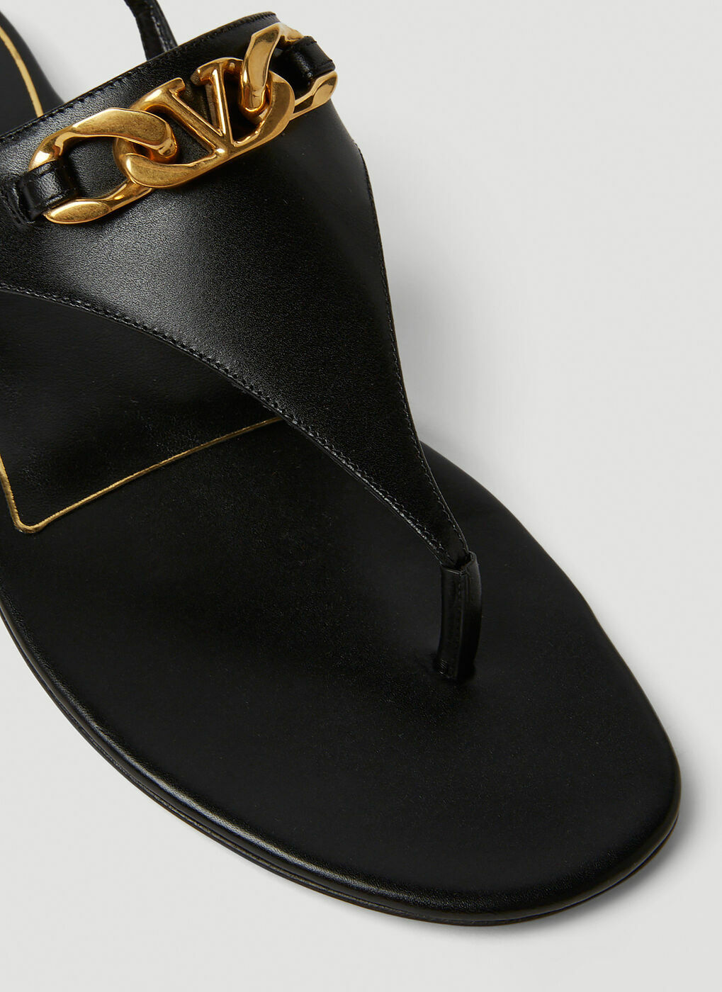 Logo Plaque Flat Sandals in Black Valentino