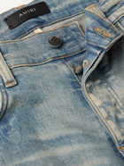 AMIRI - Cherub Skinny-Fit Distressed Printed Jeans - Blue
