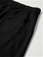 Auralee - Tapered Super 120s Crinkled Wool-Poplin Trousers - Black