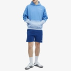 Sporty & Rich Men's Serif Logo Embroidered Hoodie in Dip Dye Blue