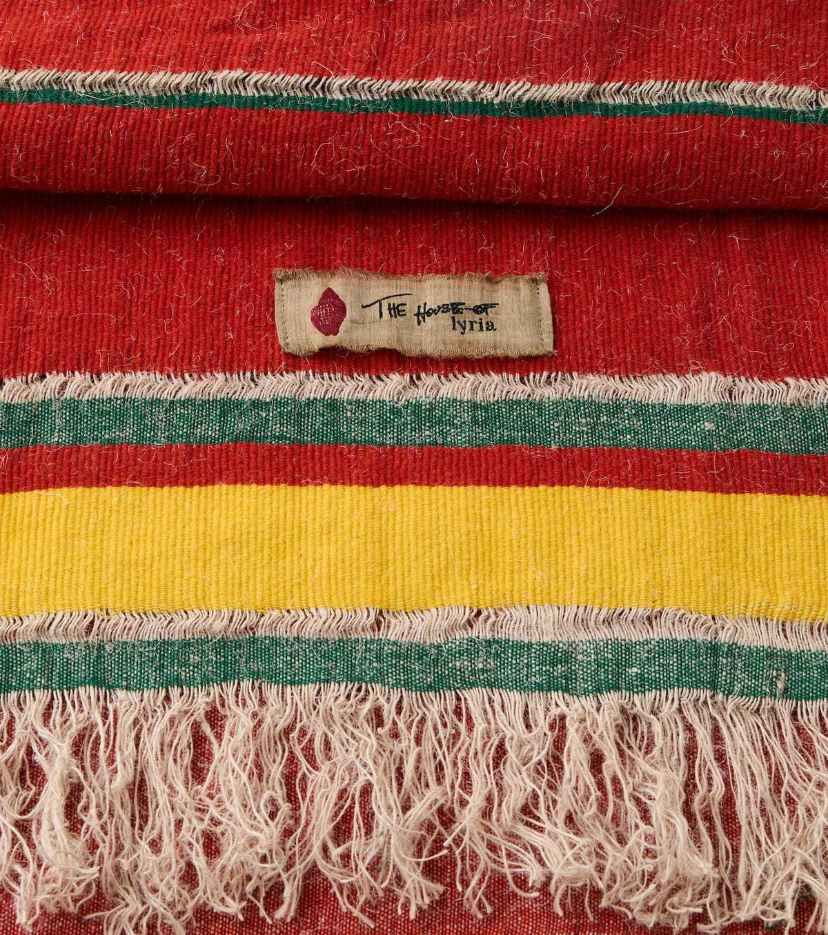 The House of Lyria Xoroi striped wool-blend throw