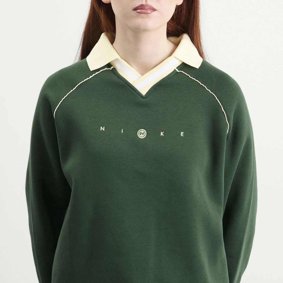 Nike Women's NSW Phoenix Polo Top in Fir/Alabaster
