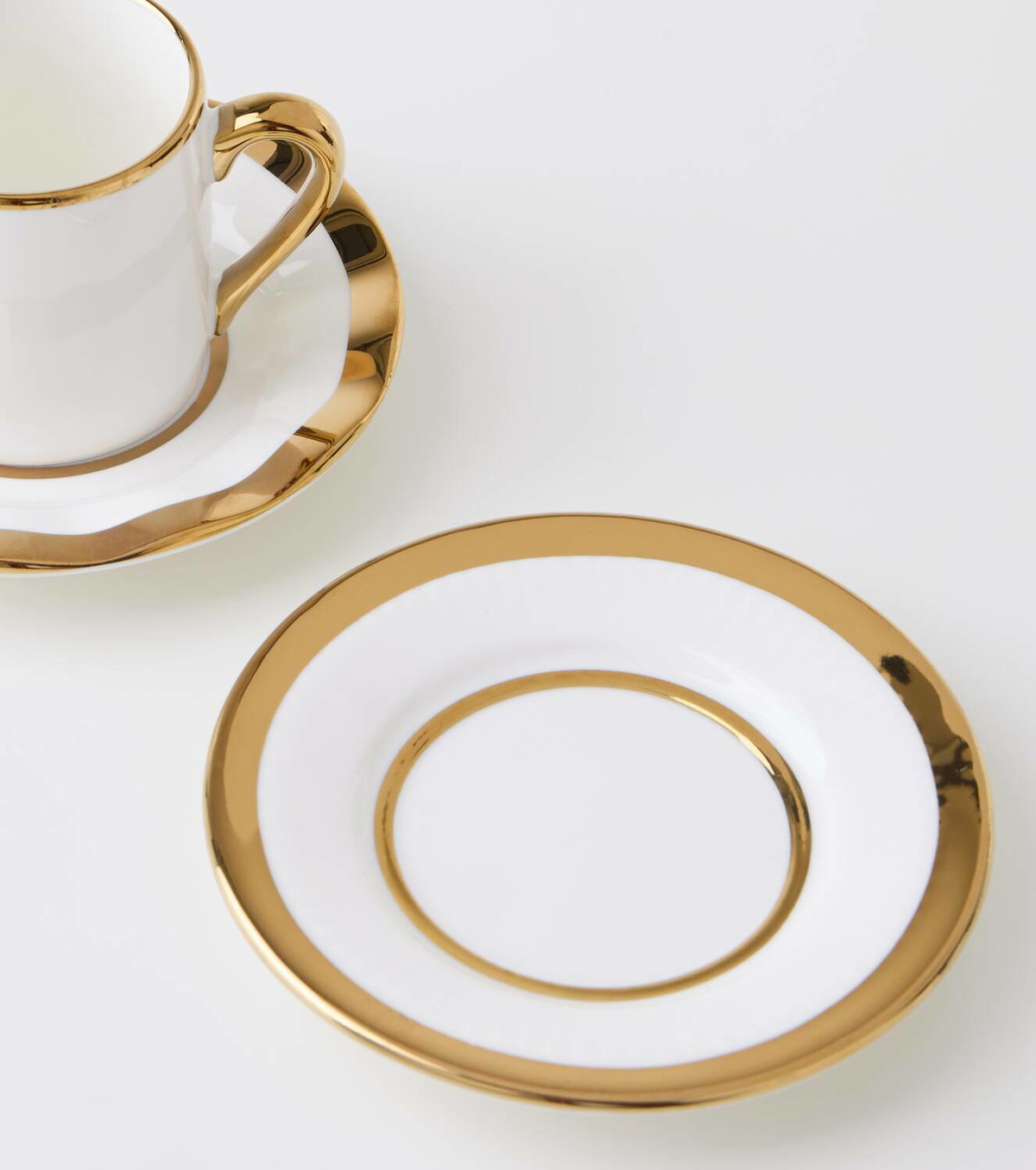 Polspotten Golden Finds set of 4 espresso cups and saucers by Jan Wolleswinkel