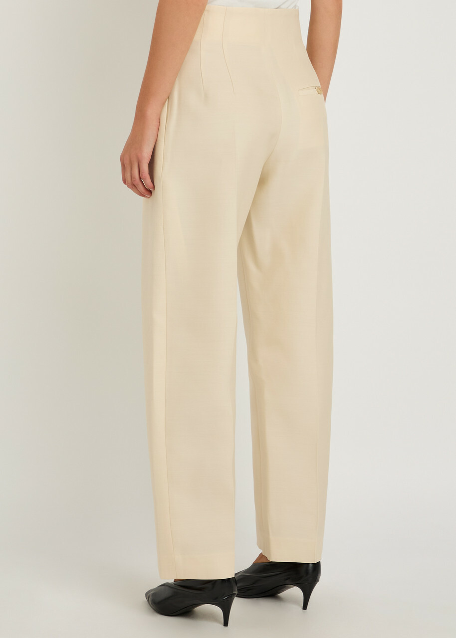 Khaite Somera Wool and Silk-blend Trousers Ivory
